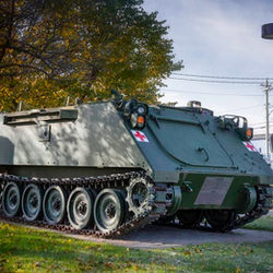 Troop carrier, in front of the Saint-Quentin public library (NB)