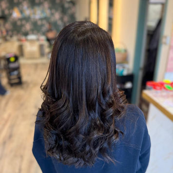 bouncy blow on dark brown hair 