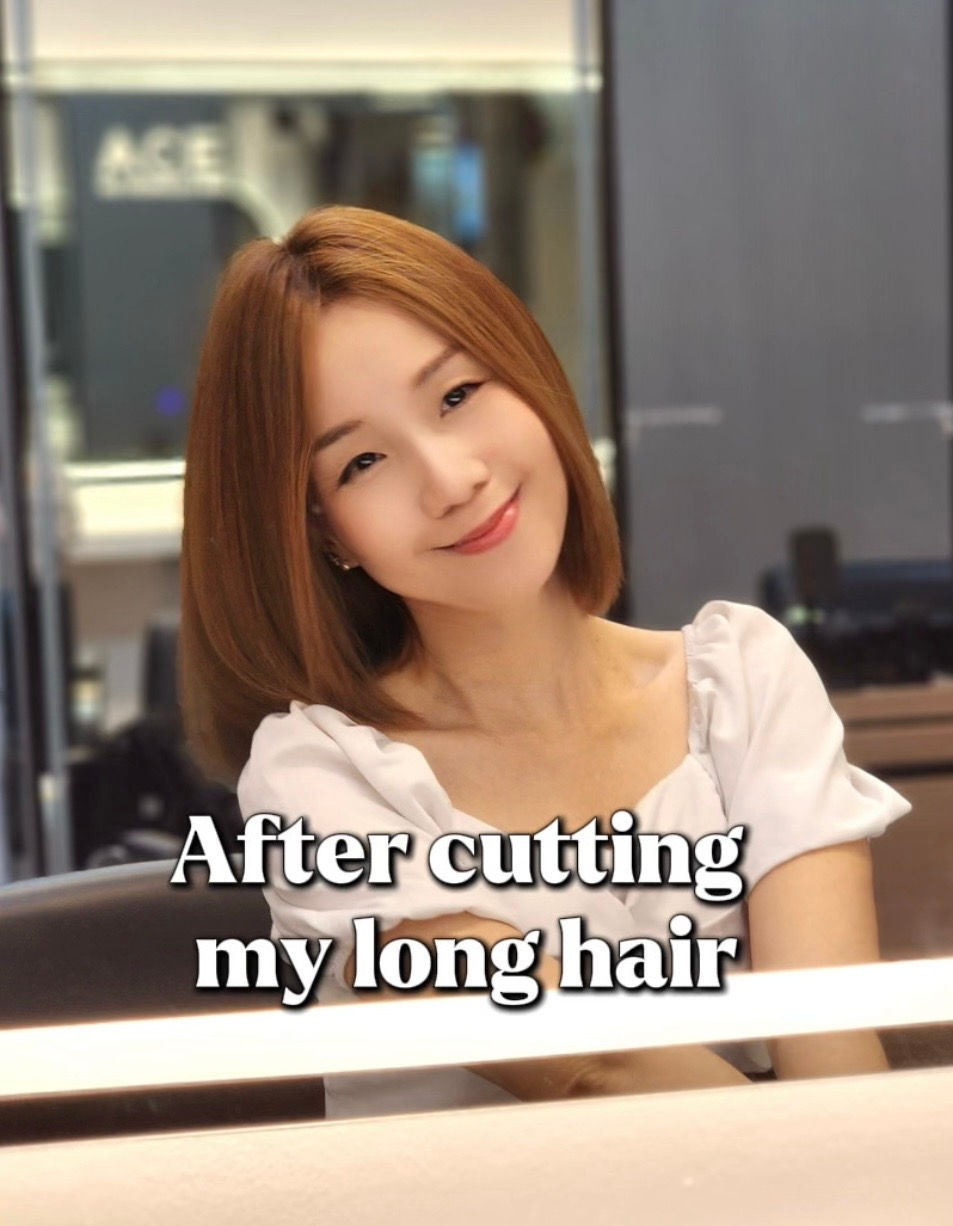 Close-up view of glossy freshly styled hair being checked under soft salon lighting