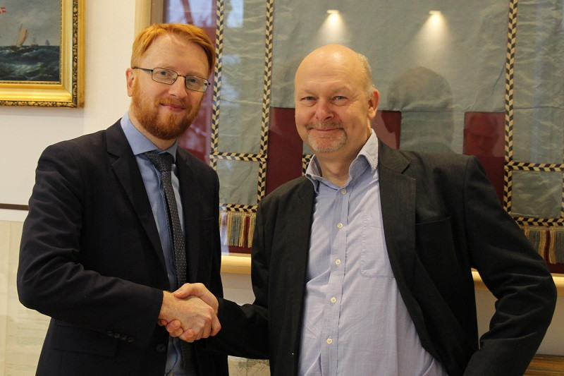 Picture shows: Richard Doherty from CIRM (left) and Aron Frank Sørensen from BIMCO (right) congratulate each other after finalizing the Standard on Software Maintenance of Shipboard Equipment text.