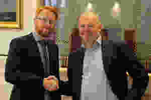 Picture shows: Richard Doherty from CIRM (left) and Aron Frank Sørensen from BIMCO (right) congratulate each other after finalizing the Standard on Software Maintenance of Shipboard Equipment text.