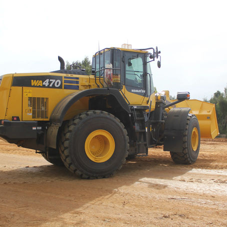 Komatsu wheel loader working on a jobsite, official Komatsu product photo