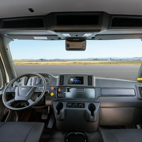 A Freightliner 114SD Plus severe-duty chassis, the kind of financed commercial truck whose insurance requirements span liability, physical damage, cargo, and bobtail coverage. Photo: Freightliner.
