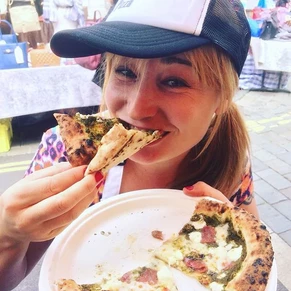 women eating Neapolitan Pizza