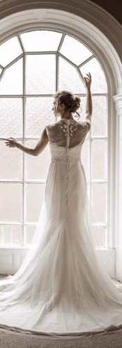 Aphrodite silk strapless fishtail gown and Almira tulle and lace appliqués overcoat from the Principium Collection. Karl Bratby Photography.