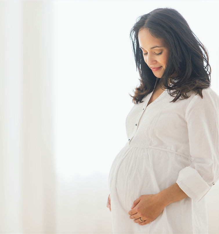 Pregnant Woman Smiling_edited.jpg