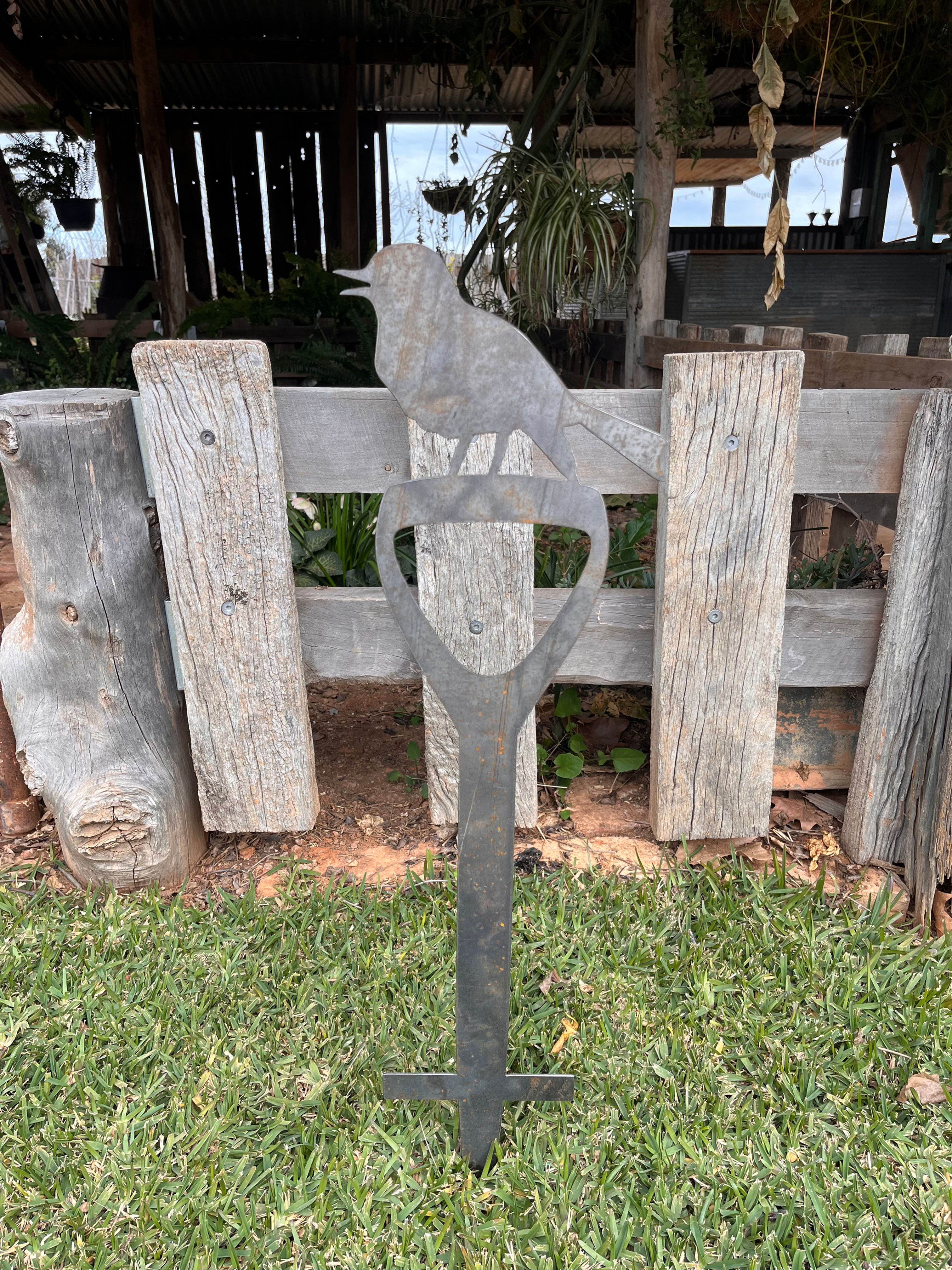 Bird on Shovel Stake