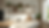 Eye-level view of floating wooden shelves with decorative plants and kitchenware