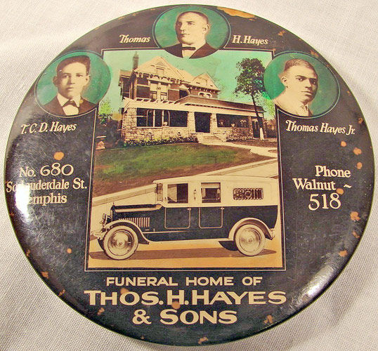 The Hayes family advertised its highly successful funeral business on a button.