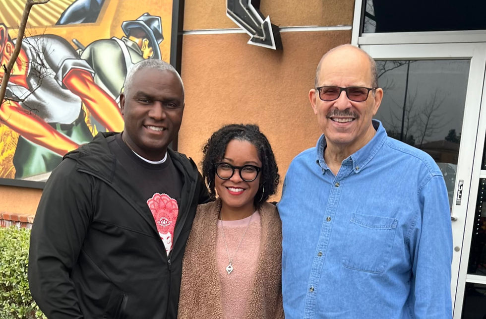 Eric and Nicole Ramsey with Donald Watkins in Sacramento in 2023.