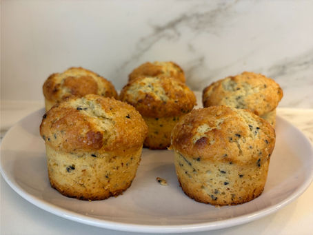 Artisan homemade lemon poppy seed muffin ready to eat on plate