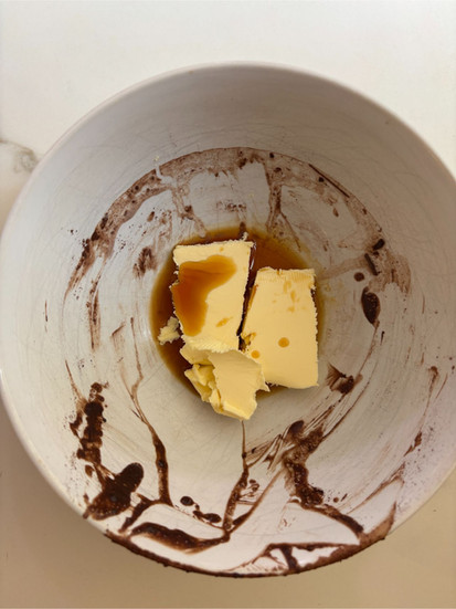 butter prepared in bowl for hot fudge sauce before adding to mixture