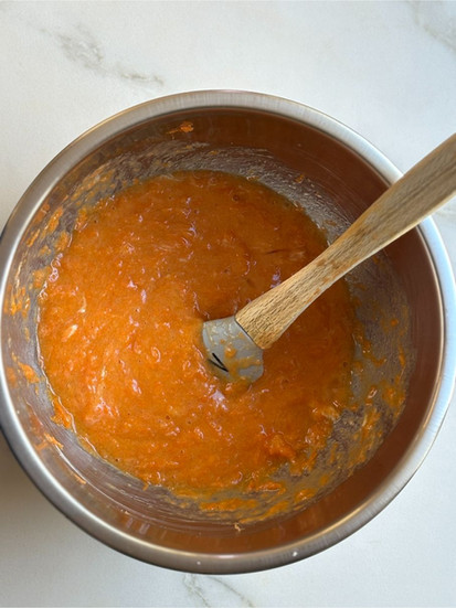 mixing the carrot in the batter