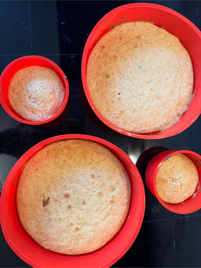 golden dulce de leche sponge cake fully baked in silicone pans with even texture