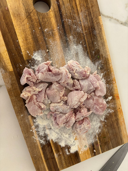 preparing the chicken with all-purpose flour