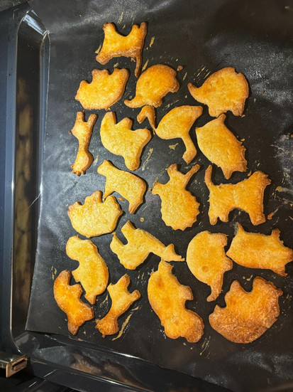 Hard shortbread cookies baking in the oven until evenly golden brown ``