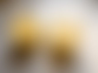 Creamy mango lassi in a glass with smooth texture and vibrant yellow color