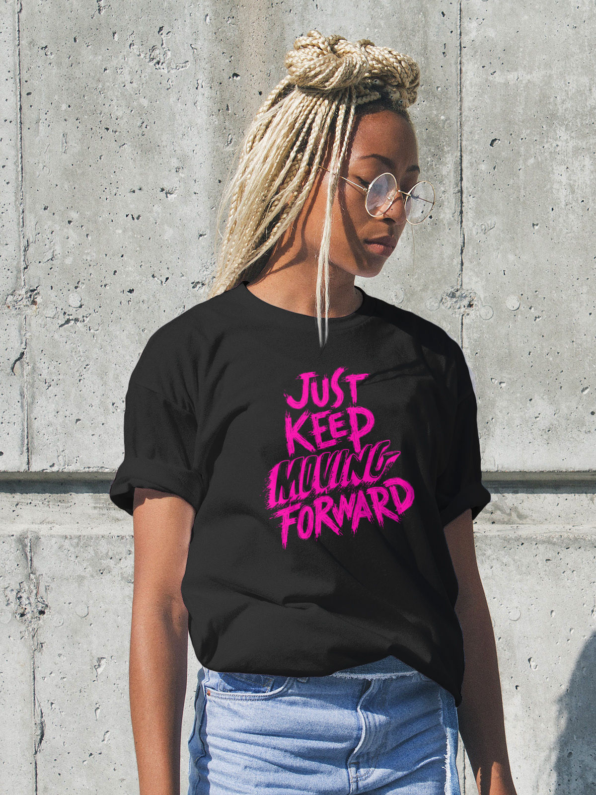 black short sleeve t-shirt with pink words Just Keep Moving Forward slanted to the left