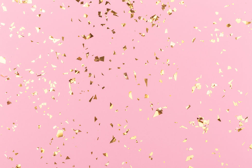 Golden sparkles on pink pastel trendy background. Festive backdrop for your projects..jpg