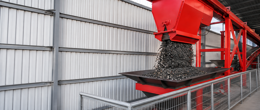 CONMACH PipeKing-800 concrete pipe machine material handling unit featuring red industrial machinery, a hopper unloading gravel/aggregates, and promotional text overlays.