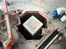 Concrete pipe manufacturing plant and Concrete pipe inside a production mold.