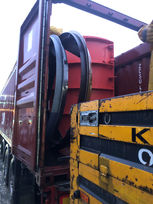 Industrial equipment loaded on a truck.