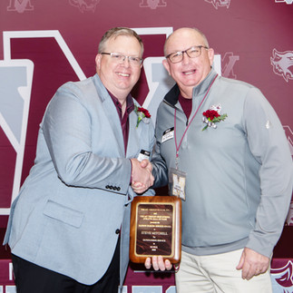 Mount Vernon teacher and coach Steve Mitchell receives the M-Club Hall of Fame Service Award