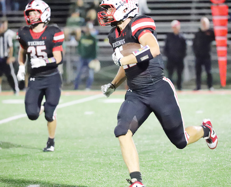 North Posey senior Cru Wilzbacher looks for some room to run following this interception during Friday evening’s homecoming win over Forest Park. Photo by Dave Pearce