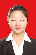 Young smiling Chinese woman wearing white shirt and black jacket