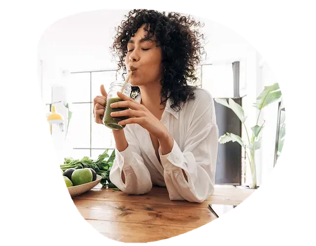Woman drinking smoothie
