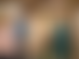 chiropractic staff welcoming a family of patients to the office