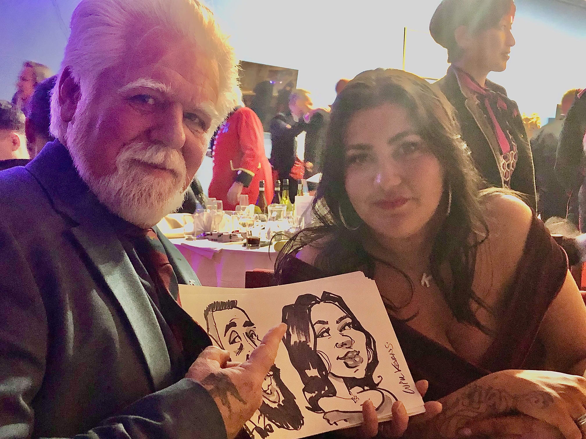 Caricaturist with party guest in Wiltshire