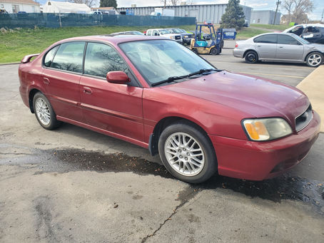 2004 Subaru Legacy sedan 2.5l 84k M/T Red