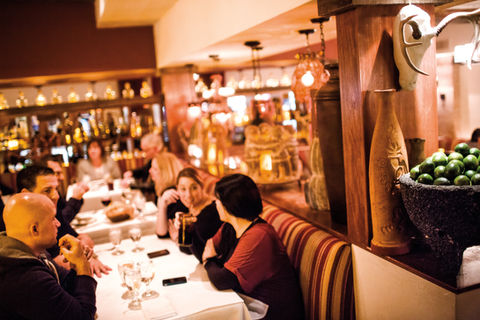 Diners Enjoying a Night Out at Besito Mexican Restaurant