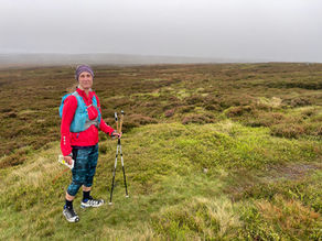 Sarah Gilbertson Nordic walking outdoors on a hill  - real-world movement and professional experience