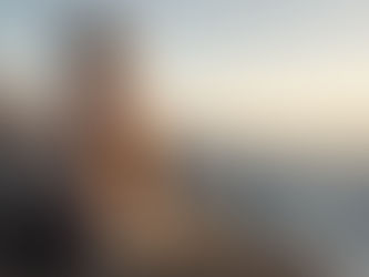 Meditator breathing at a mountain overlook