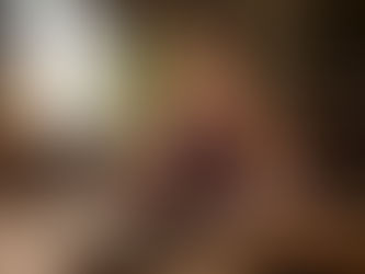 Woman meditating in warm earthy room