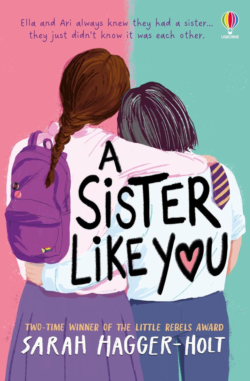 The backs of 2 girls, waist up. 1 with long brown hair; 1 bobbed black hair. In school uniforms, arms around each other.