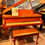 Thumbnail: Steinway Model M mahogany grand piano with matching bench – Piano Planet – $44,900 front view