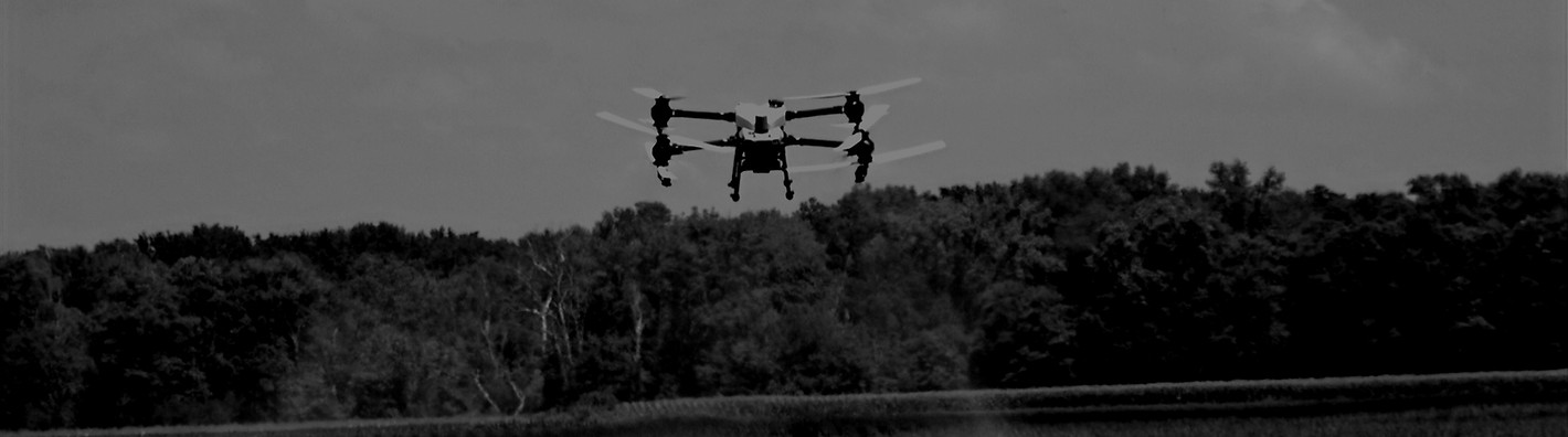Drone spraying crops in Southern Illinois farmland