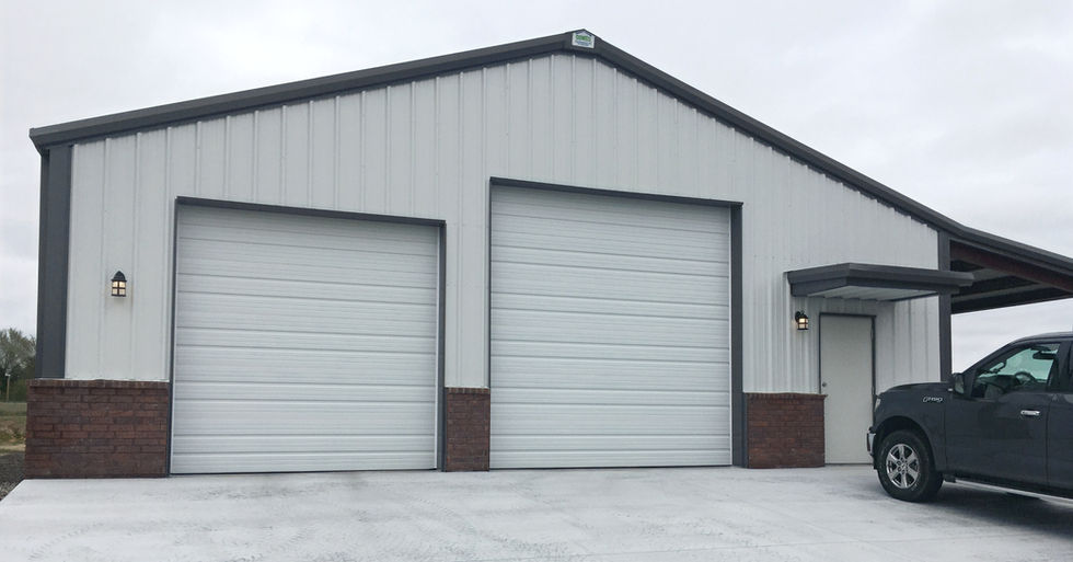 Metal Shop Building with Brick Wainscot. Manufactured by Cowell Steel Structures. 