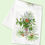 Thumbnail: Image of white cotton tea towel printed with hand-illustrated pine and berry bouquet