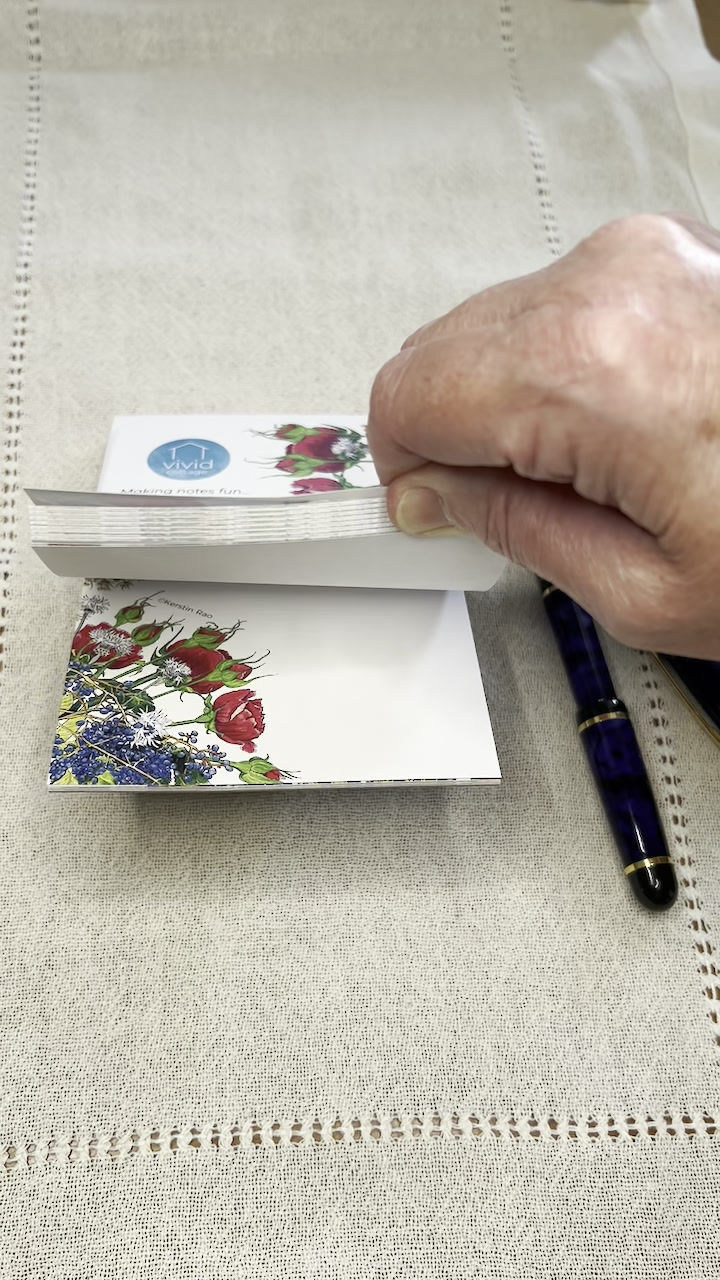Thumbnail: Video flipping pages of America 250 notepad
