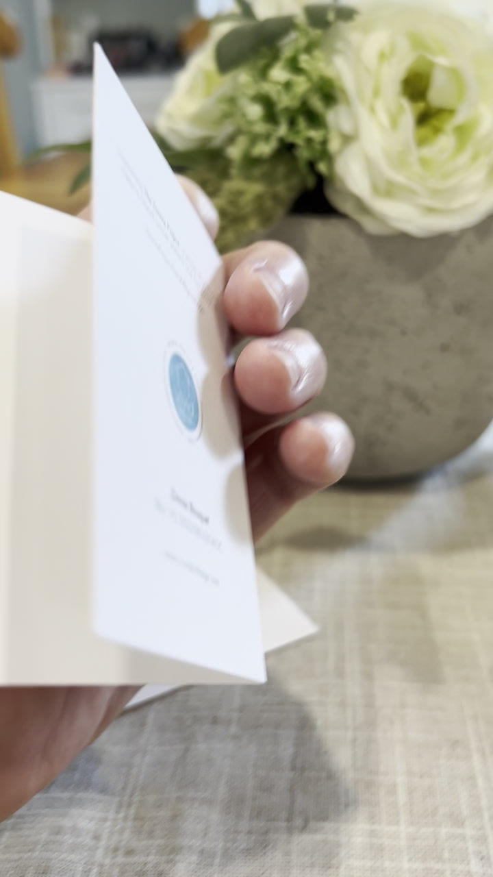 Thumbnail: Video showing all sides of gift enclosure card illustrated with multi-colored zinnias