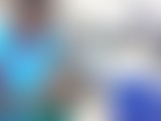 Zipora at work at a sewing machine