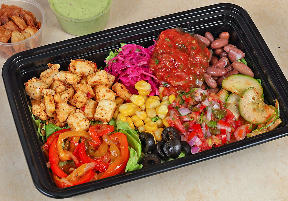 Close-up view of a colorful plate filled with fresh fruits and vegetables