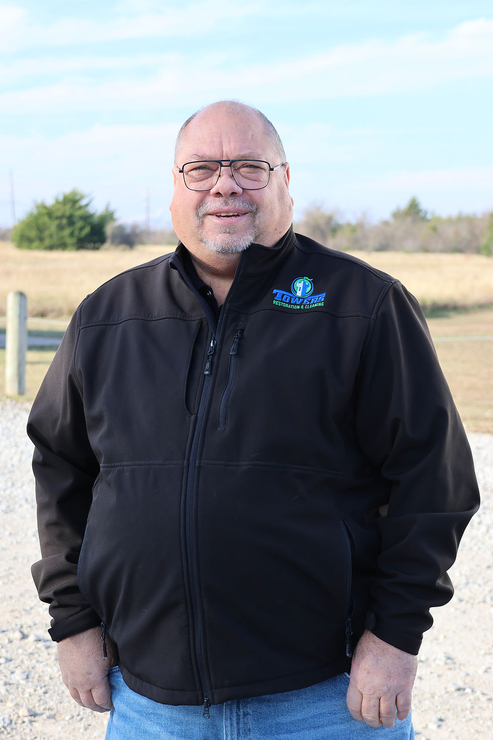 Owner, Jimmy, of Towers and Restoration Cleaning smiling outside