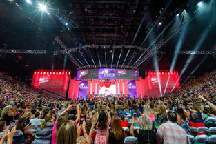crowd at an indoor convention stadium arena