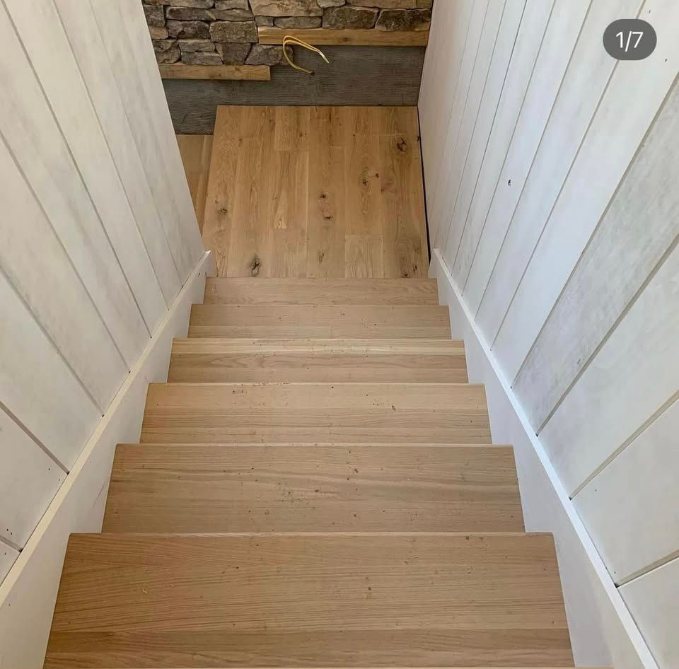 Eye-level view of a cozy living room with elegant hardwood flooring