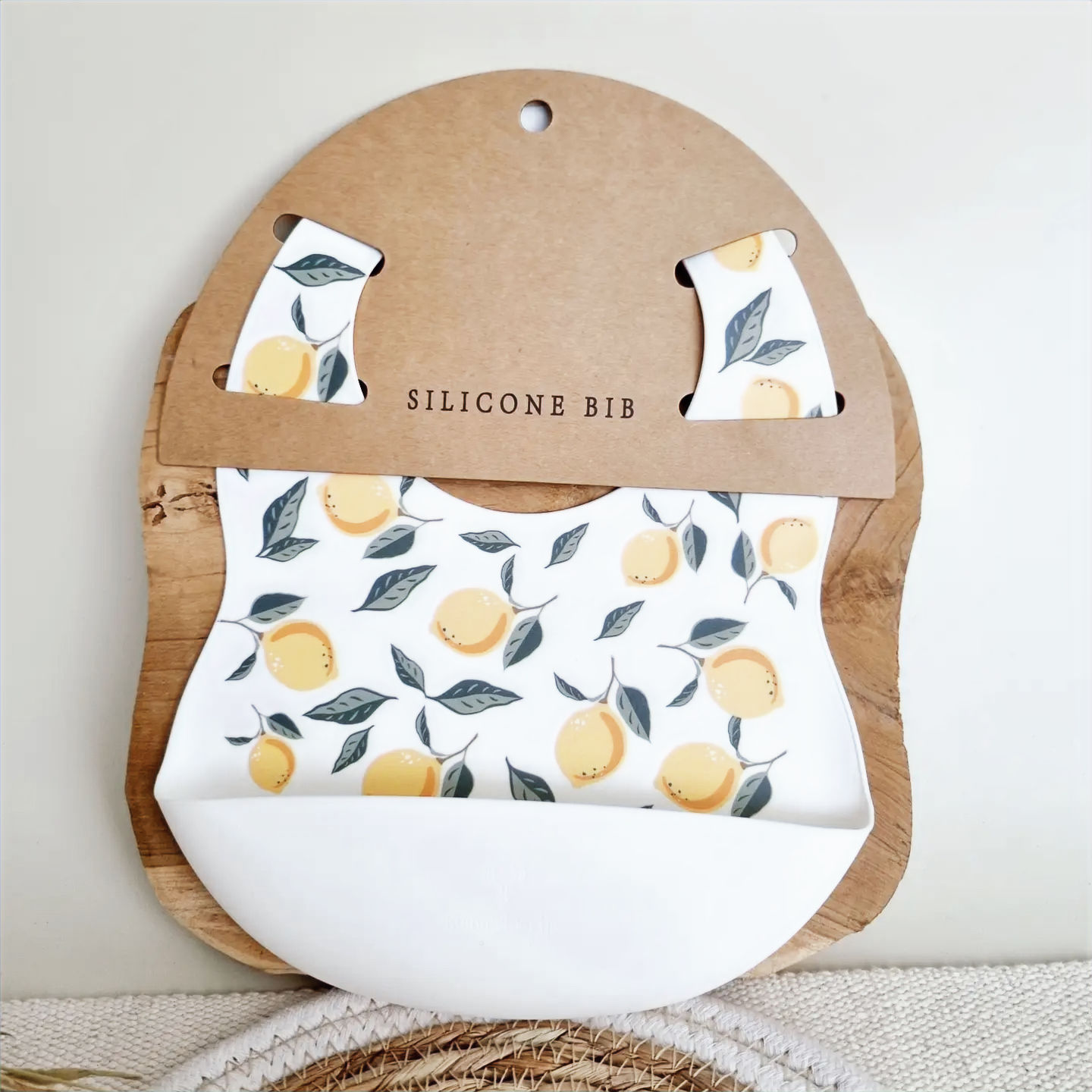 Babero de silicona con bandeja recoge-migas Limones